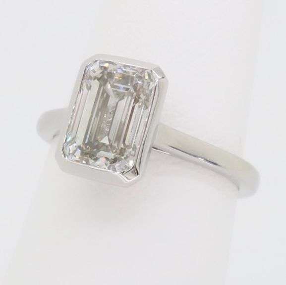 Emerald Cut Diamond in a Bezel Setting
