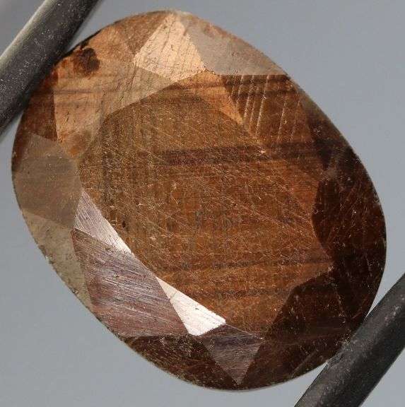 UNTREATED! Shimmering 15.29ct earth toned faceted Sapphire
