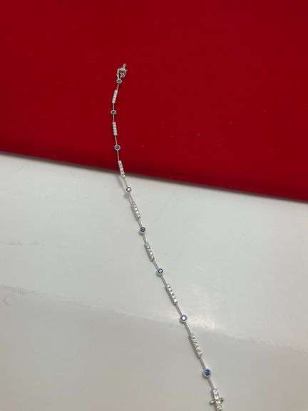 CERTIFIED 18K WHITE GOLD DIAMOND AND SAPPHIRE BRACELET.