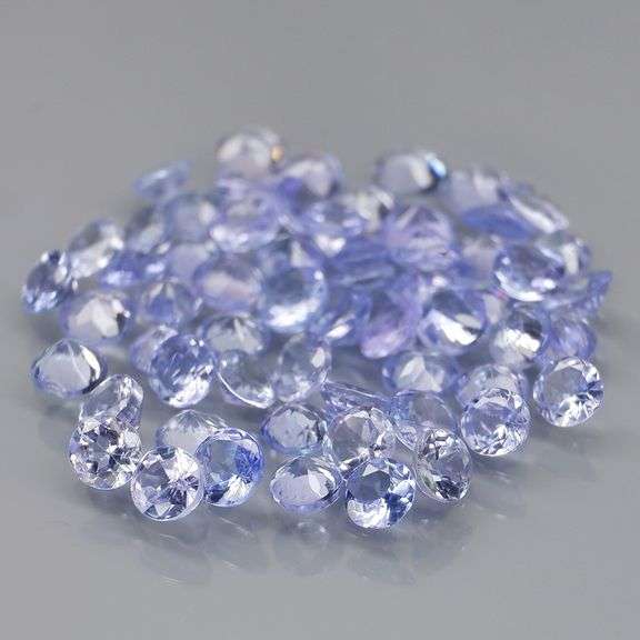 Heavy flashing 3.89ct diamond cut Tanzanite set
