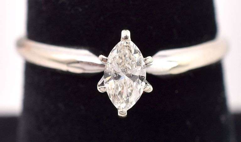 Delightful 14K white Gold Solitaire Diamond Ring