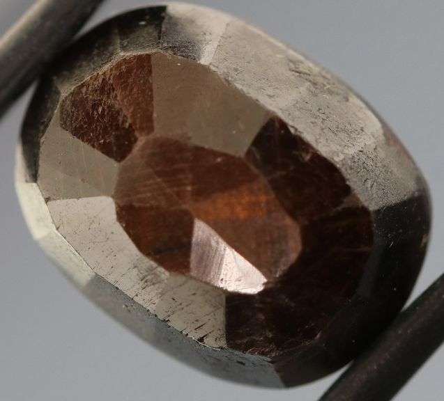 UNTREATED! Shimmering 15.29ct earth toned faceted Sapphire