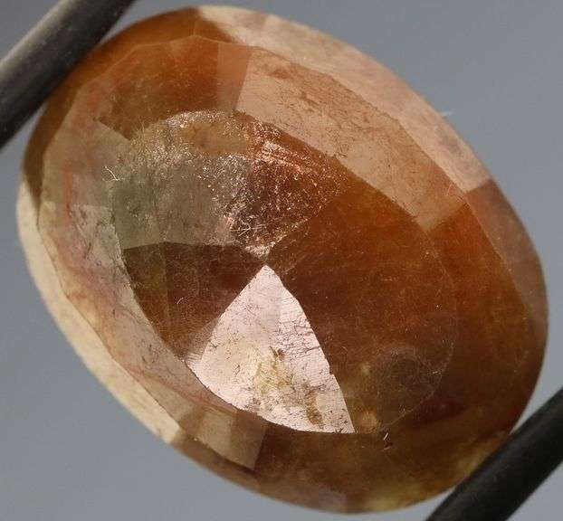 UNTREATED! Shimmering 16.74ct earth toned faceted Sapphire