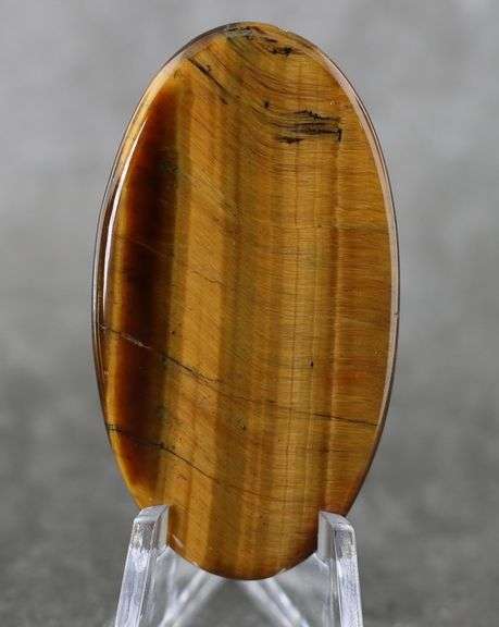 Full body shimmer! 64.19ct Golden Tiger Eye cabochon