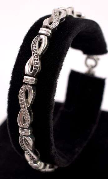 Sterling Silver Diamond and Blue Sapphire Infinity Bracelet
