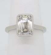 Emerald Cut Diamond in a Bezel Setting