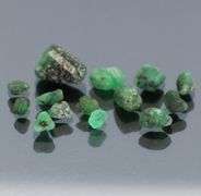 Untreated 10.13ct collectors uncut Emerald set