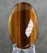 Full body shimmer! 59.04ct Golden Tiger Eye cabochon