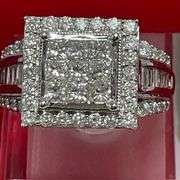 CERTIFIED 14K WHITE GOLD AND DIAMOND RING. 2.50 CARATS