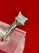 CERTIFIED BRAND NEW LADIES 14K WHITE GOLD SOLITAIRE DIAMOND RING.