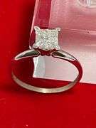 CERTIFIED BRAND NEW LADIES 14K WHITE GOLD SOLITAIRE DIAMOND RING.
