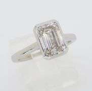 Emerald Cut Diamond in a Bezel Setting
