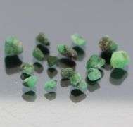 Untreated 10.23ct collectors uncut Emerald set