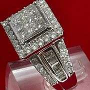CERTIFIED 14K WHITE GOLD AND DIAMOND RING. 2.50 CARATS