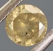 Gorgeous .29ct silvery yellow Diamond solitaire