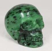 Detailed 675ct Zoisite skull carving