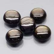 Stunning 7.49ct golden black Star Sapphire set