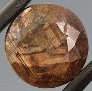 UNTREATED! Shimmering 8.05ct earth toned faceted Sapphire