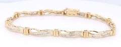 Attractive Baguette Diamond Wave Link Bracelet in Yelow Gold