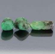 Untreated 11.81ct collectors uncut Emerald set