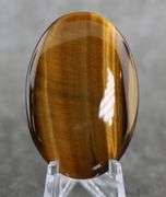 Mezmerizing 61.28ct Tigers Eye cabochon