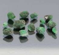 Collectable 10.02ct uncut Emerald set