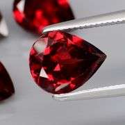 Premium 6.94ct pear cut cherry red Garnet set