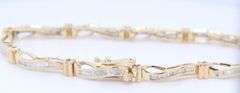 Attractive Baguette Diamond Wave Link Bracelet in Yelow Gold