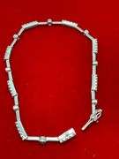CERTIFIED 18K WHITE GOLD DIAMOND AND SAPPHIRE BRACELET.