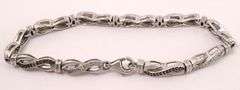 Sterling Silver Diamond and Blue Sapphire Infinity Bracelet