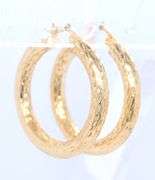 Lovely Yellow Gold Diamond Cut Hoop Earrings