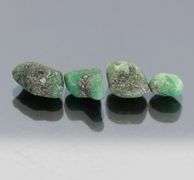 Untreated 10.99ct collectors uncut Emerald set