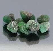 Collectable 10.30ct uncut Emerald set