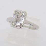Emerald Cut Diamond in a Bezel Setting