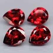 Premium 6.94ct pear cut cherry red Garnet set