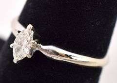 Delightful 14K white Gold Solitaire Diamond Ring