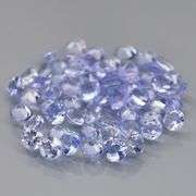 Heavy flashing 3.89ct diamond cut Tanzanite set
