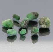 Collectable 10.50ct uncut Emerald set