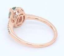 Charming Rose Gold oval Green Spinel in Diamond Halo Ring