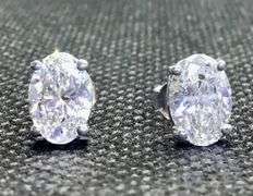 GORGEOUS AND ELEGANT 14K WHITE GOLD OVAL CUT SOLITAIRE DIAMOND STUD