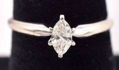 Delightful 14K white Gold Solitaire Diamond Ring