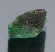 Untreated 10.74ct uncut Emerald