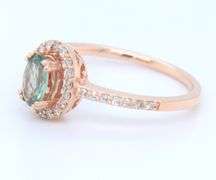 Charming Rose Gold oval Green Spinel in Diamond Halo Ring