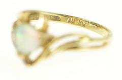 10K Yellow Gold Trillion Sim. Opal Diamond Accent Bypass Ring