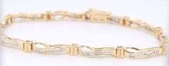 Attractive Baguette Diamond Wave Link Bracelet in Yelow Gold