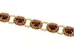 10K Yellow Gold Oval Garnet Halo Encrusted Statement Bracelet