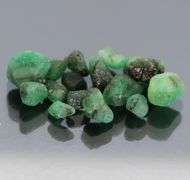 Untreated 10.23ct collectors uncut Emerald set