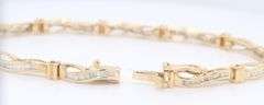 Attractive Baguette Diamond Wave Link Bracelet in Yelow Gold