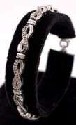 Sterling Silver Diamond and Blue Sapphire Infinity Bracelet