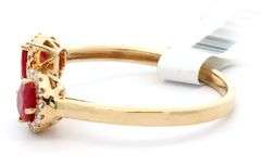 New 0.75ctw Ruby and 0.13ctw Diamond Frame Bypass Ring in 14K